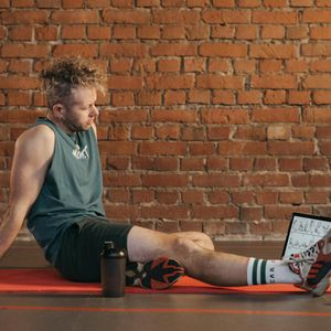 Person resting calmly after finishing a workout session.